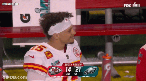 Man In Chiefs Jersey Sitting In Dugout GIF