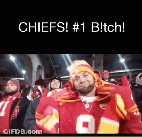 Man In Chiefs Jersey Standing In Crowd GIF