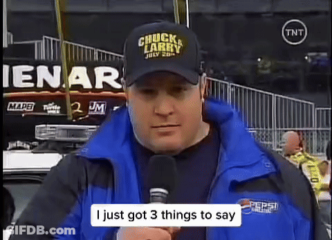 Man In Chuck Larry Hat Talking Into Microphone GIF