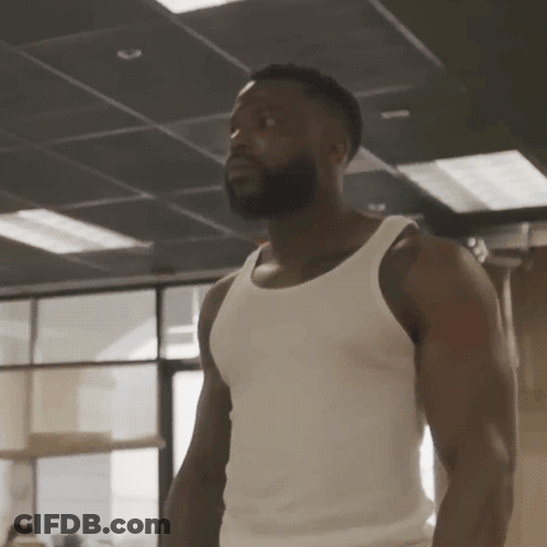 Man In Cleveland 23 Jersey Standing In Room GIF