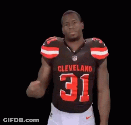 Man In Cleveland 31 Jersey Flexing Arm GIF