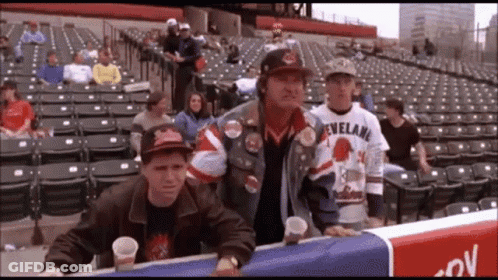 Man In Cleveland Baseball Jersey Standing In Stadium GIF