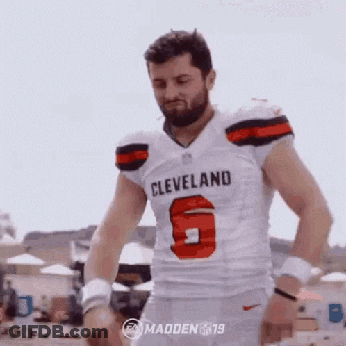 Man In Cleveland Browns Jersey On Beach GIF