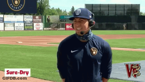 Man In Cleveland Jersey Sitting By Cooler GIF