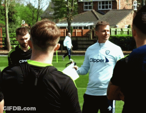 Man In Clipper Shirt Talking To Group GIF
