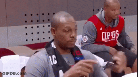 Man In Clippers Jersey Sitting In Stadium GIF