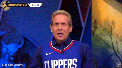 Man In Clippers Jersey Talking On TV GIF