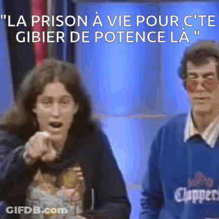 Man In Clippers Sweater Next To Pointing Woman GIF