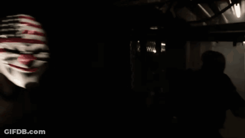 Man In Clown Mask With American Flag GIF