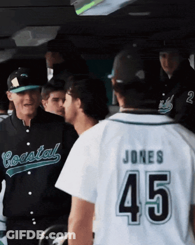 Man In Coastal Jersey Talking To Another Man GIF
