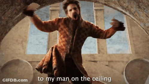 Man In Coat Dancing With To My Man On The Ceiling GIF