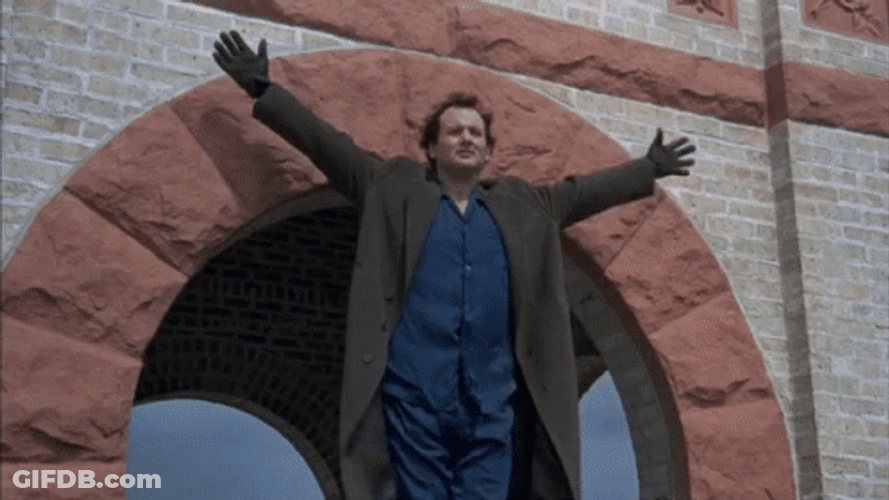 Man In Coat Jumping Out Window GIF