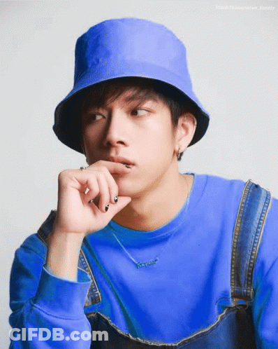 Man In Colorful Shirt And Woman In Purple Coat GIF