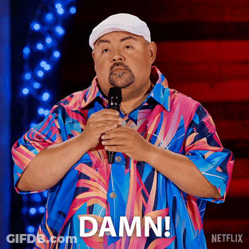 Man In Colorful Shirt Holding Microphone Saying Damn GIF