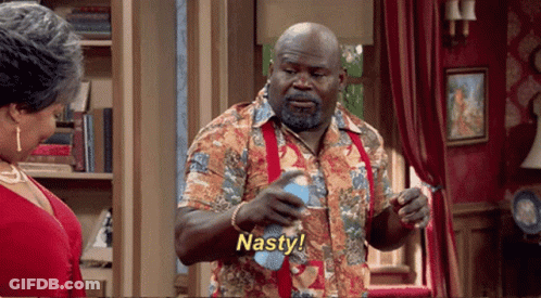 Man In Colorful Shirt Says Nasty GIF
