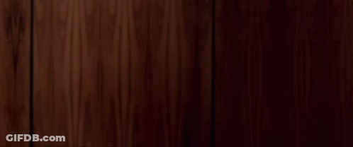 Man In Colorful Shirt Standing In Crowd Saying In The House GIF