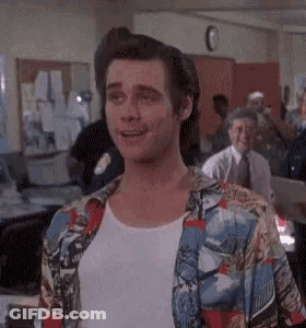 Man In Colorful Shirt Standing With Group GIF
