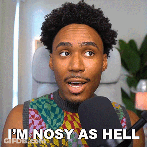 Man In Colorful Sweater Saying Im Nosy As Hell GIF