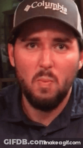 Man In Columbia Hat Making Face GIF