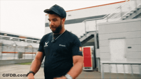 Man In Columbia T-Shirt And Baseball Cap GIF