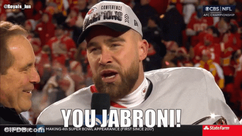 Man In Conference Champions Hat Interviewed GIF