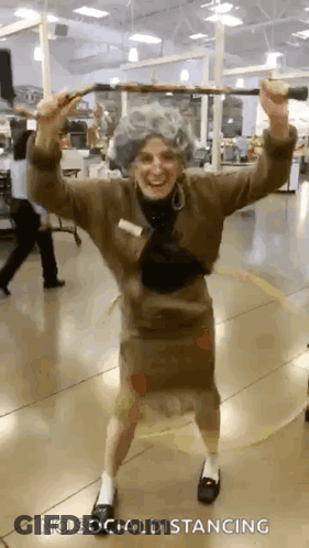 Man In Costume Dancing With Cane GIF