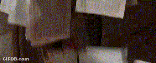 Man In Costume Held Up By Another Man GIF