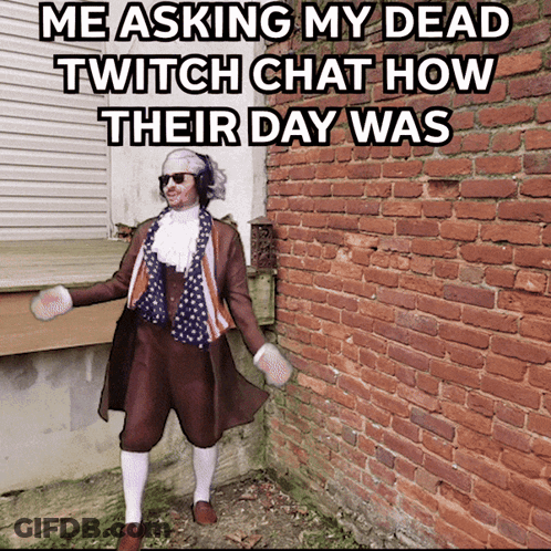 Man In Costume In Front Of Brick Wall GIF