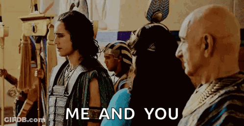 Man In Costume Standing Before Crowd GIF