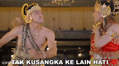 Man In Costume Standing Beside Woman Tak Kusangka Ke Lain Hati GIF