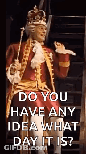 Man In Costume With Crown Holding Cane And Sword GIF