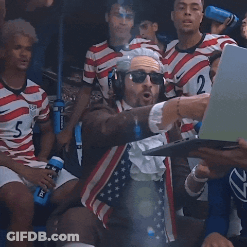 Man In Costume With Number 2 GIF