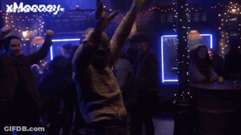 Man In Costume With Word Xmooney GIF