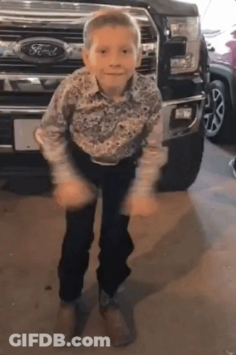 Man In Cowboy Boots And Baseball Cap In Store GIF
