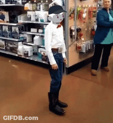 Man In Cowboy Boots And Baseball Cap In Store GIF