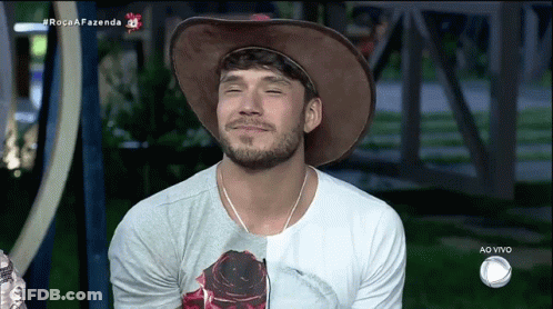 Man In Cowboy Hat And Ao Vivo T-Shirt GIF