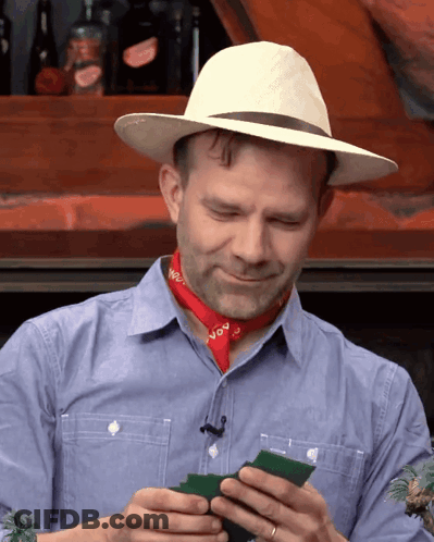Man In Cowboy Hat And Bandana Saying NVO GIF