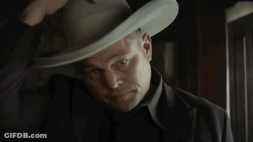 Man In Cowboy Hat And Black Shirt GIF