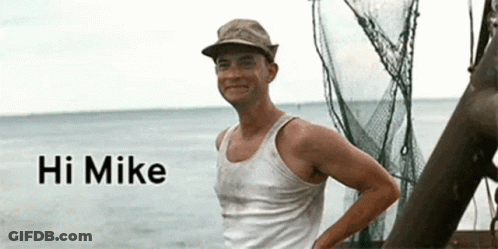 Man In Cowboy Hat And Blue Mike Shirt GIF