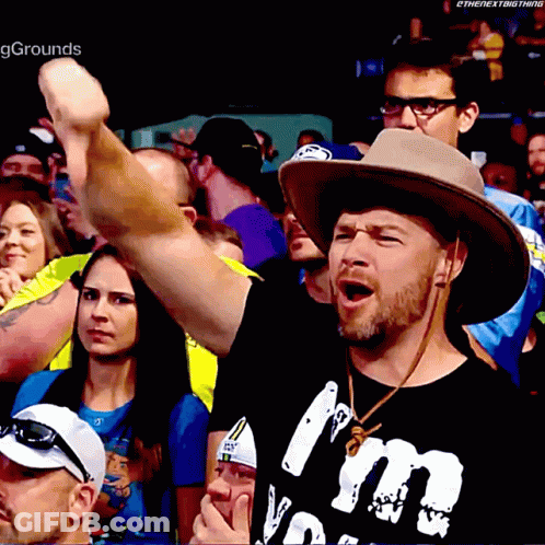 Man In Cowboy Hat And Crowd T-Shirt GIF