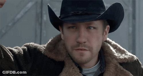 Man In Cowboy Hat And Fur Coat GIF