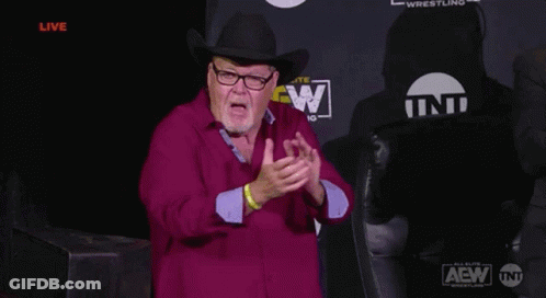 Man In Cowboy Hat And Glasses In Front Of AEW Wrestling Sign GIF