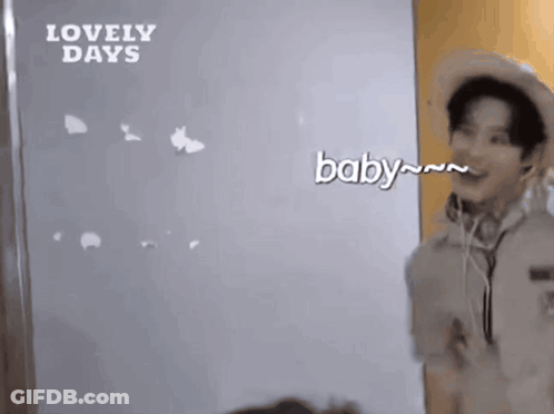 Man In Cowboy Hat And Headphones Says Baby GIF