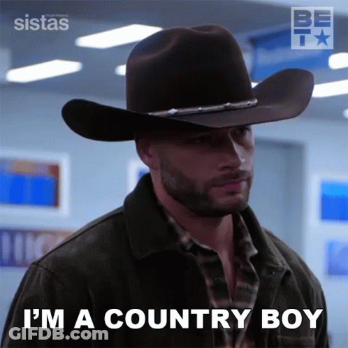 Man In Cowboy Hat And Jacket Says I'm A Country Boy GIF