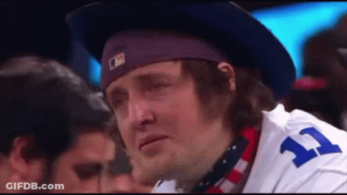 Man In Cowboy Hat And Jersey Number 11 GIF