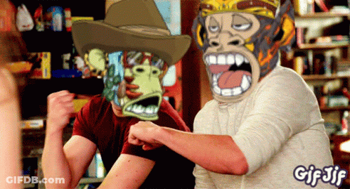 Man In Cowboy Hat And Monkey Mask GIF
