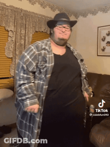 Man In Cowboy Hat And Plaid Shirt Dancing GIF