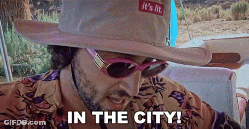 Man In Cowboy Hat And Sunglasses Says In The City GIF