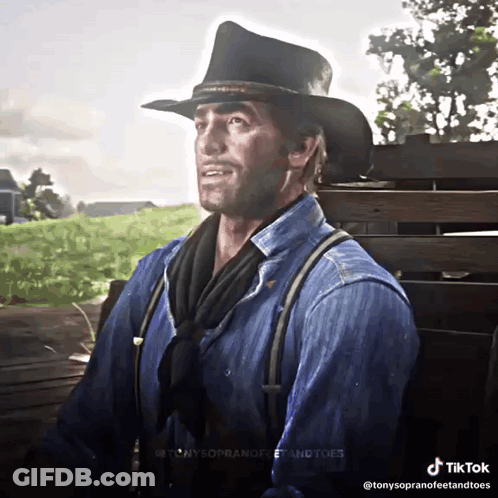 Man In Cowboy Hat And Suspenders GIF