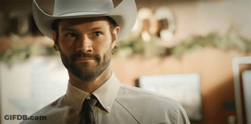Man In Cowboy Hat And Tie GIF